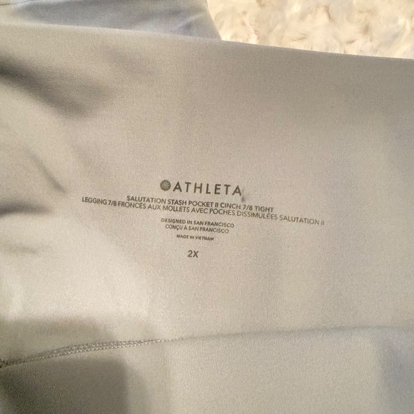 Athleta  SALUTATION STASH POCKET| CINCH 7/8 TIGHTS - Picture 3 of 8